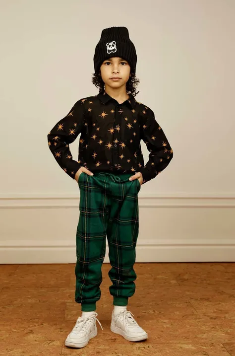 Детские хлопковые штаны Mini Rodini цвет зелёный с узором