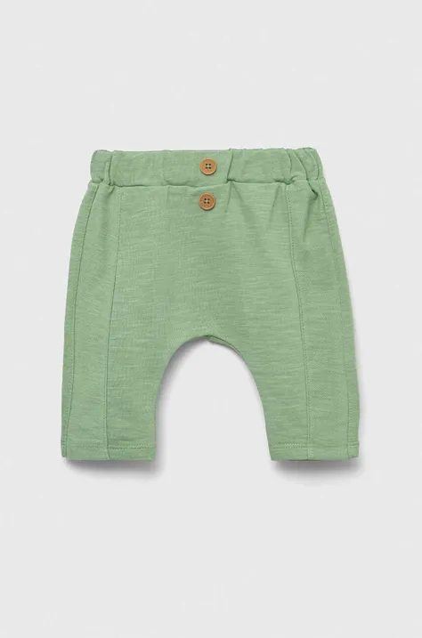 Хлопковые штаны для младенцев United Colors of Benetton цвет зелёный однотонные