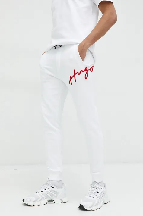 Бавовняні спортивні штани HUGO чоловічі колір білий з аплікацією