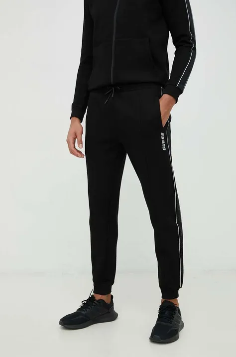 Спортивні штани Guess чоловічі колір чорний з принтом