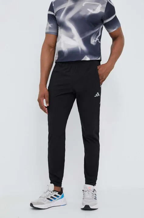 Штани для бігу adidas Performance колір чорний однотонні