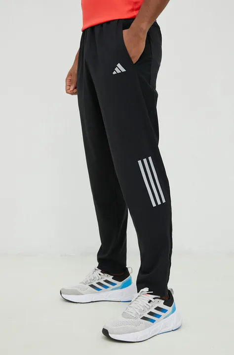 Hlače za trčanje adidas Performance Own the Run za muškarce, boja: crna, s tiskom