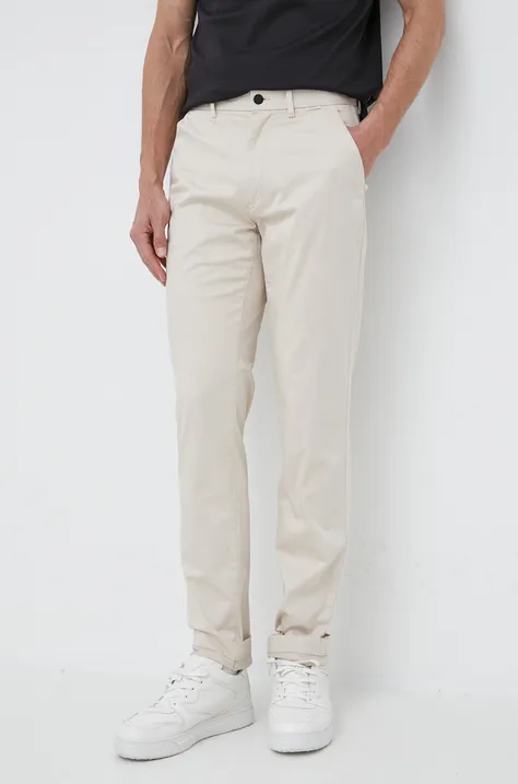 Nohavice Calvin Klein pánske, béžová farba, priliehavé
