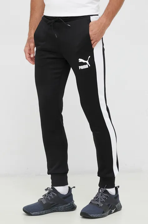Спортен панталон Puma в черно с десен