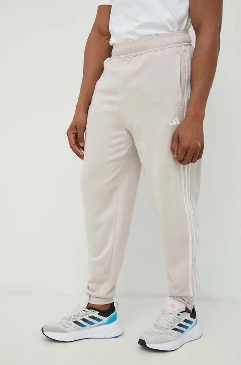 adidas Performance spodnie dresowe męskie kolor beżowy z aplikacją