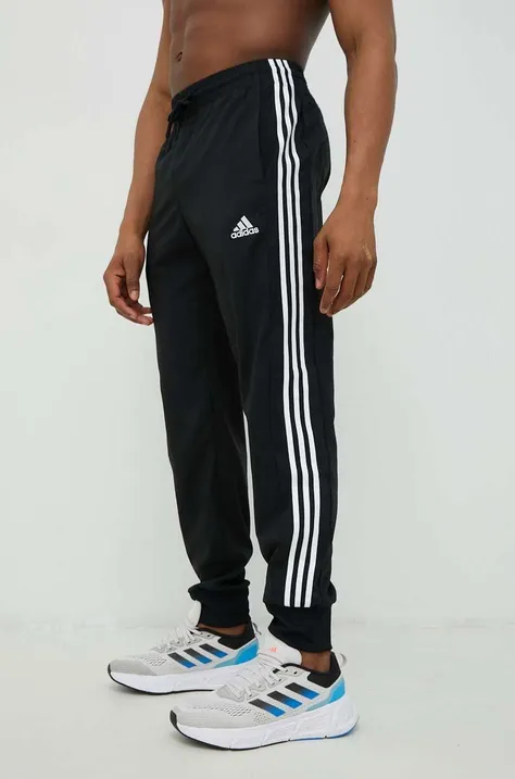 Тренировочные брюки adidas мужские цвет чёрный с аппликацией