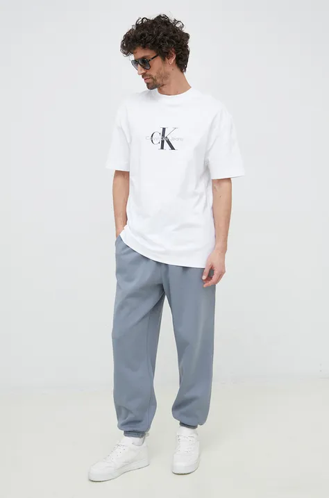 Calvin Klein Jeans pantaloni de trening culoarea gri, cu imprimeu