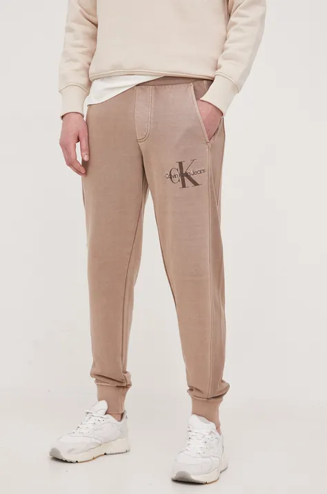 Calvin Klein Jeans spodnie dresowe bawełniane kolor brązowy gładkie