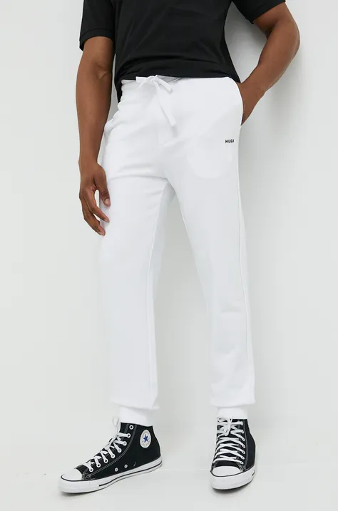 Бавовняні спортивні штани HUGO колір білий однотонні