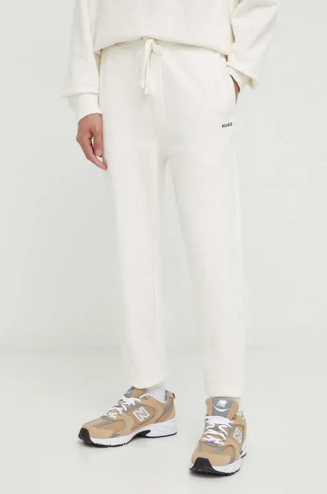 Бавовняні спортивні штани HUGO колір білий однотонні