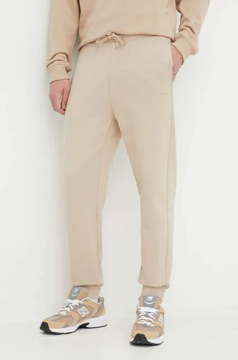 HUGO spodnie dresowe bawełniane kolor beżowy gładkie
