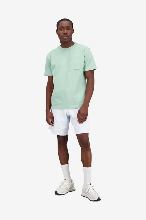 Памучна тениска New Balance в зелено с изчистен дизайн