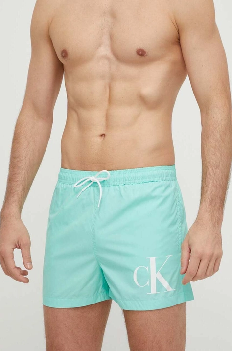 Плувни шорти Calvin Klein в зелено KM0KM00967