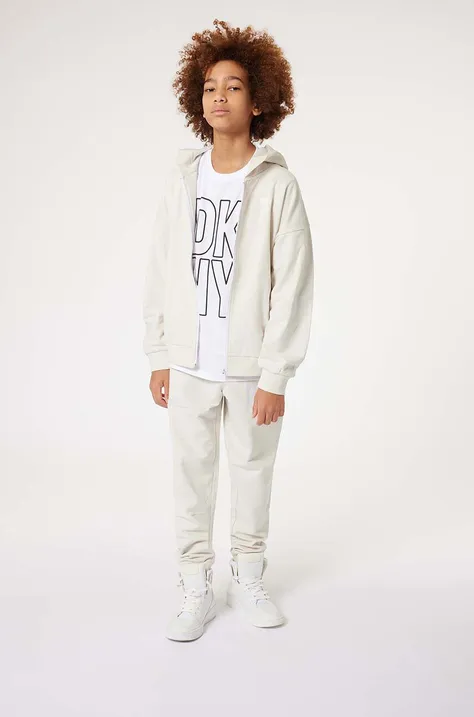 Παιδική βαμβακερή μπλούζα DKNY χρώμα: άσπρο, με κουκούλα