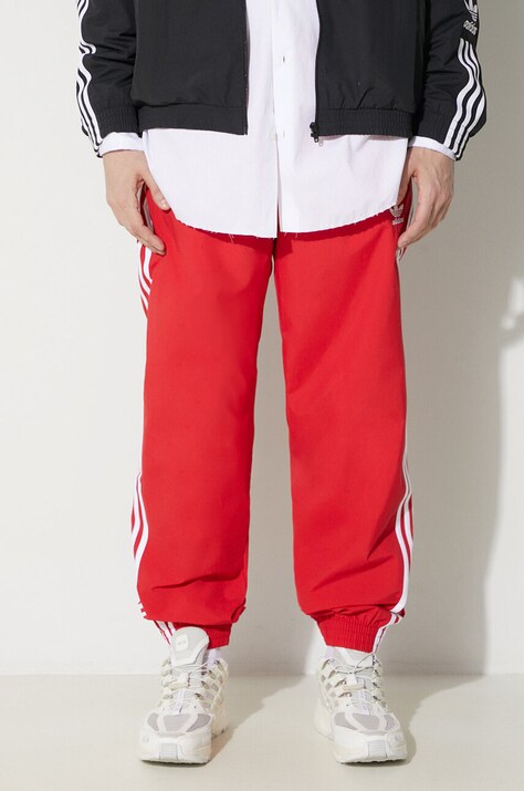 Спортивные штаны adidas Originals Adicolor Woven Firebird Track Top цвет красный с аппликацией IT2498