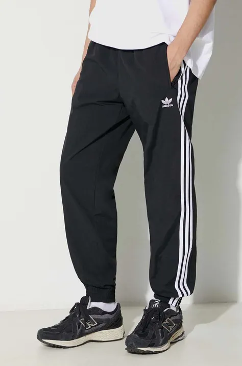 Панталон adidas Originals Adicolor Woven Firebird Track Top в черно с десен IT2501