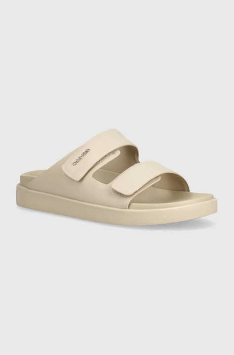 Δερμάτινες παντόφλες Calvin Klein FLAT ADJ SLIDE CALVIN MTL LTH γυναικείες, χρώμα: μπεζ, HW0HW01954