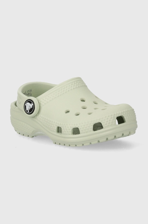 Otroški natikači Crocs CLASSIC CLOG zelena barva