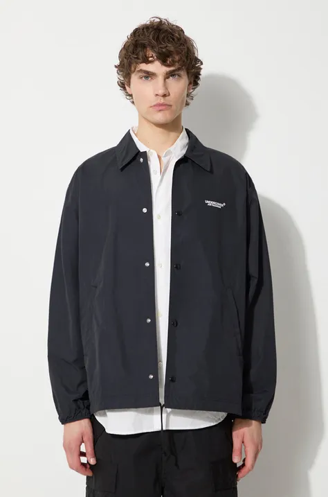 Bunda Undercover Jacket pánska, tmavomodrá farba, prechodná, oversize, UB0D4201