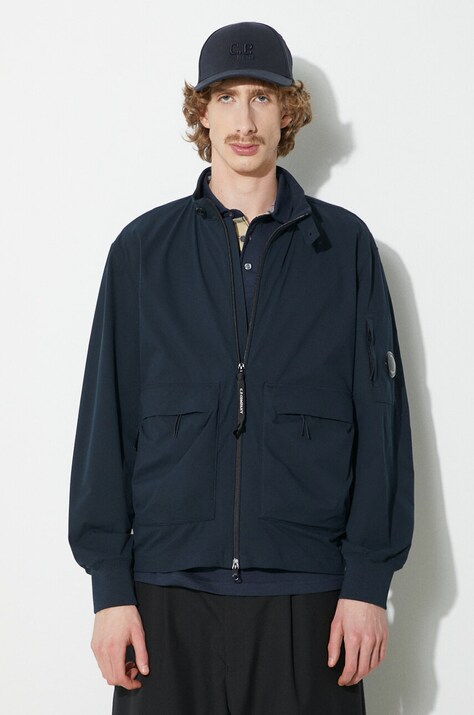 C.P. Company geaca Pro-Tek Bomber barbati, culoarea albastru marin, de tranzitie, 16CMOW010A004117A