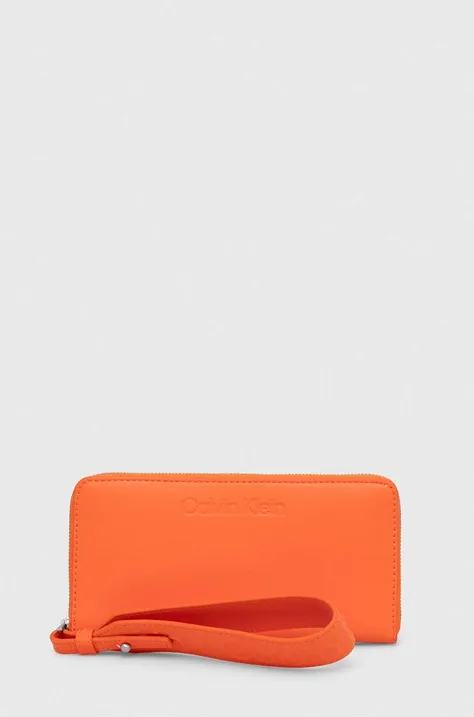 Peněženka Calvin Klein oranžová barva