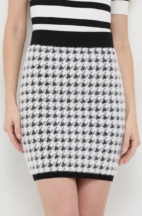 Suknja s primjesom vune Guess boja: crna, mini, pencil