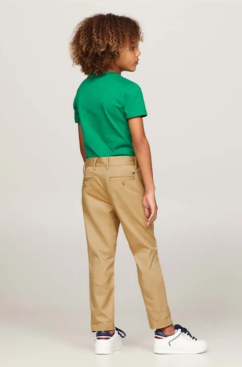 Tommy Hilfiger spodnie dziecięce kolor żółty gładkie