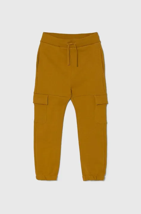Детски памучен спортен панталон United Colors of Benetton в жълто с изчистен дизайн