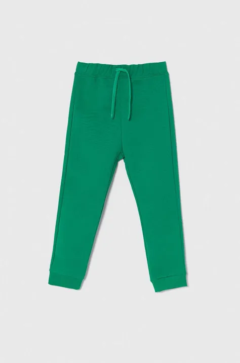 Дитячі бавовняні штани United Colors of Benetton колір зелений однотонні