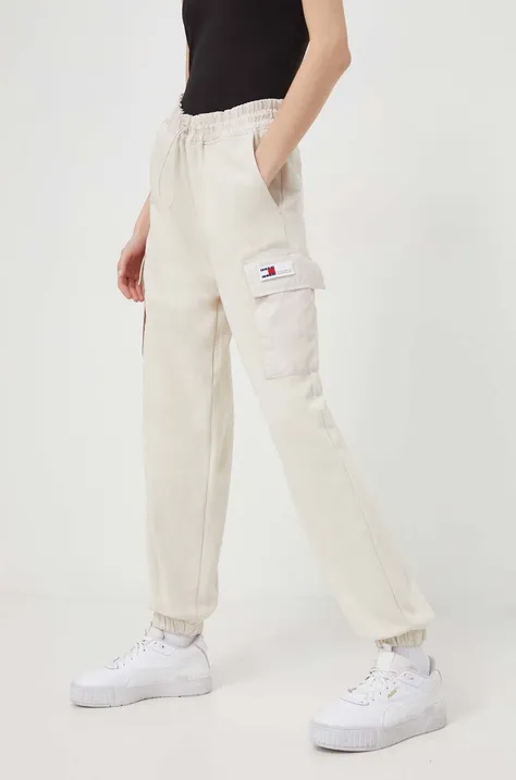Tommy Jeans spodnie dresowe kolor beżowy gładkie