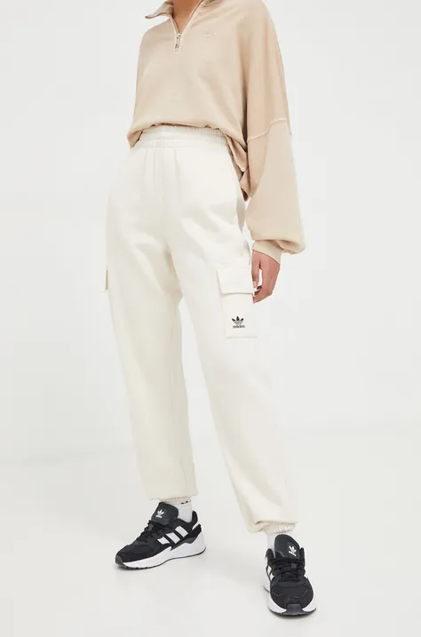adidas Originals spodnie dresowe kolor beżowy gładkie