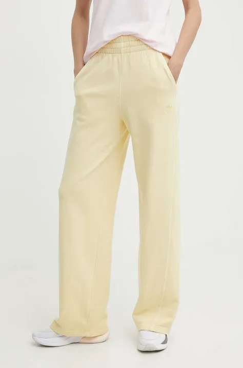 adidas Originals spodnie dresowe bawełniane kolor żółty gładkie