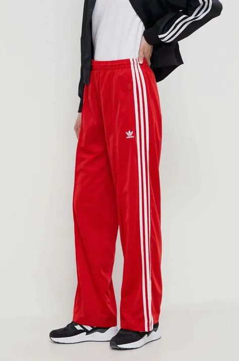 Donji dio trenirke adidas Originals Firebird Loose boja: crvena, s aplikacijom, IP0632