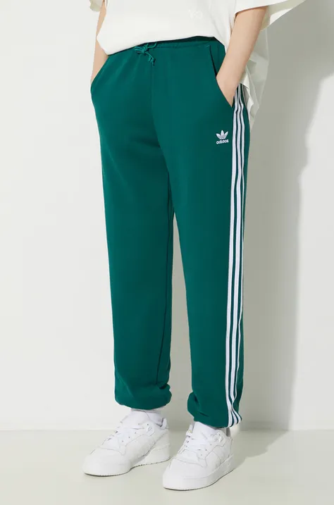 Памучен спортен панталон adidas Originals Jogger Pants в зелено с апликация IR8090