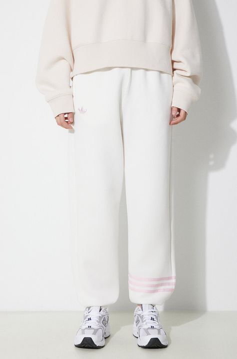 Tepláky adidas Originals béžová barva, hladké, IU2502