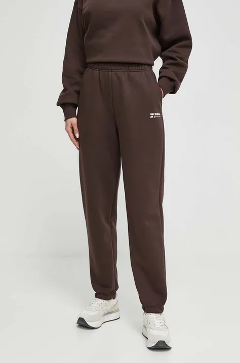 New Balance spodnie dresowe WP33513KCF kolor brązowy gładkie