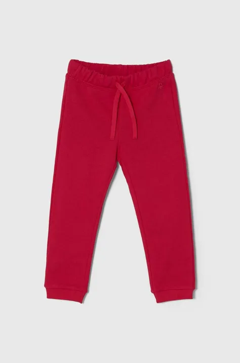 Дитячі бавовняні штани United Colors of Benetton колір рожевий однотонні