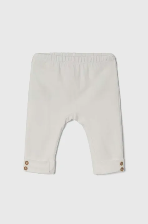 United Colors of Benetton spodnie niemowlęce kolor biały gładkie