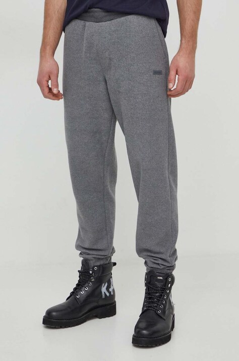Spodnji del trenirke Calvin Klein siva barva