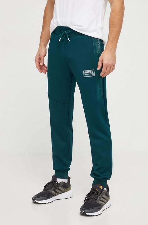 Guess pantaloni de trening culoarea verde, cu imprimeu