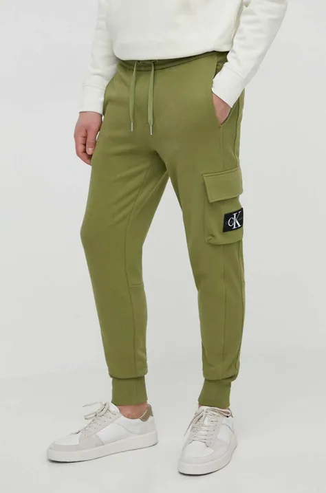 Pamučni donji dio trenirke Calvin Klein Jeans boja: zelena, bez uzorka