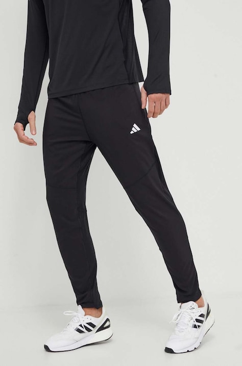Штани для бігу adidas Performance Own the Run колір чорний з принтом