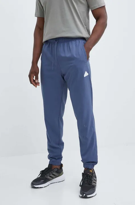 Спортен панталон adidas в синьо с апликация IN0696