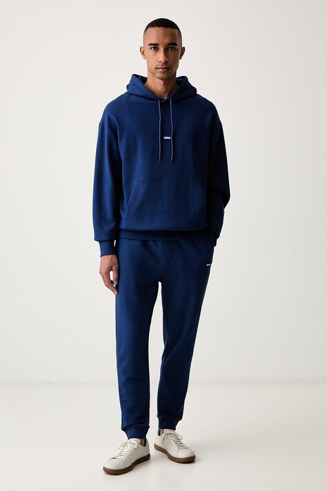 HUGO Blue спортивные штаны для мужчин из хлопка Napin тёмно-синие regular waist 50522372