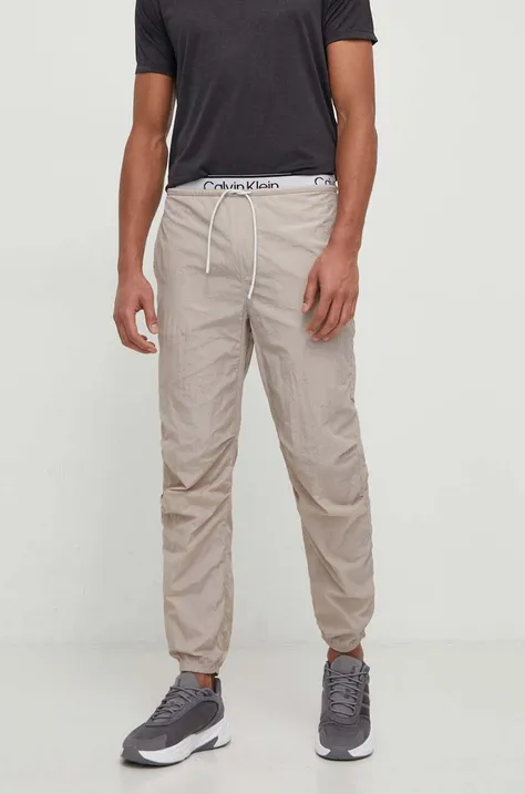 Tréninkové kalhoty Calvin Klein Performance šedá barva, s potiskem