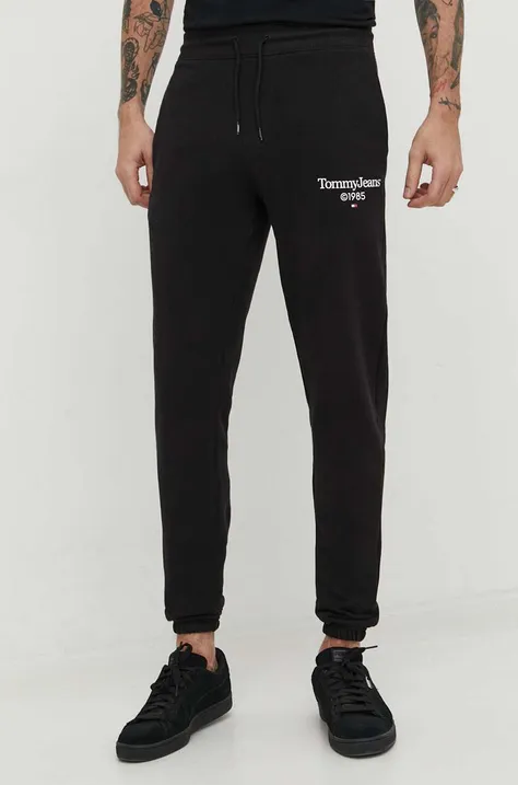 Bavlněné tepláky Tommy Jeans černá barva, s potiskem, DM0DM18935