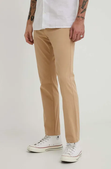 Nohavice Tommy Jeans pánske, béžová farba, priliehavé
