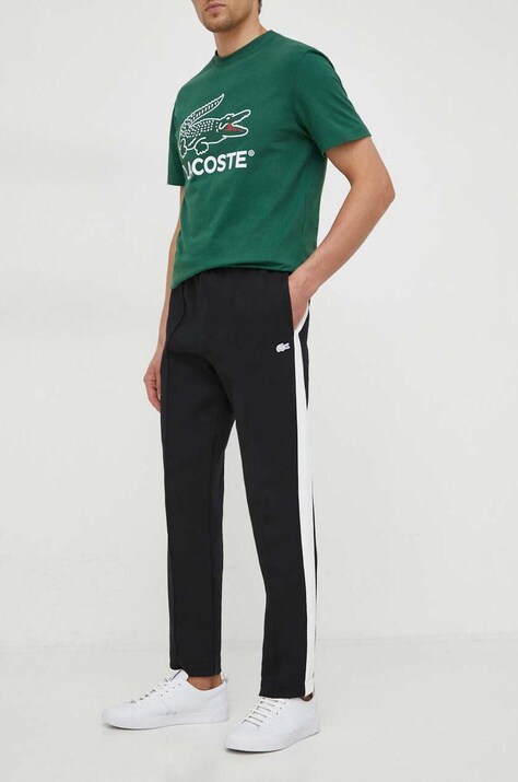Спортивные штаны Lacoste цвет чёрный с аппликацией