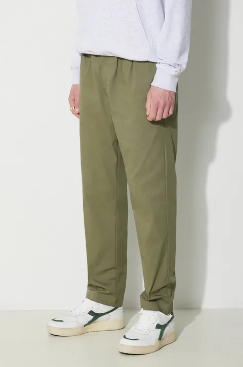 Nohavice New Balance pánske, zelená farba, rovné