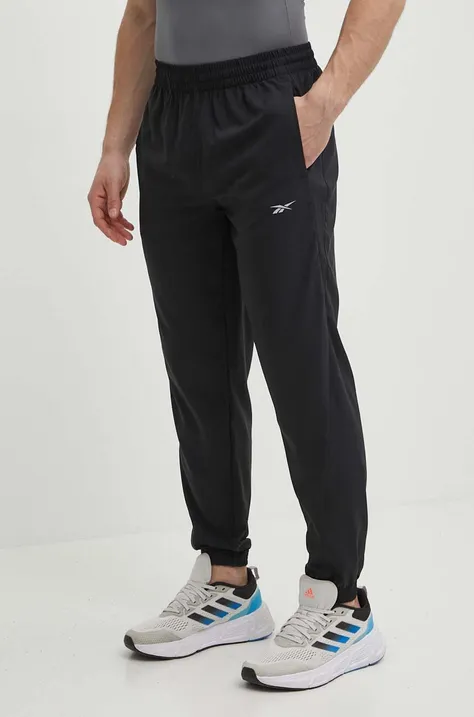 Панталон за джогинг Reebok в черно със стандартна кройка 100075619